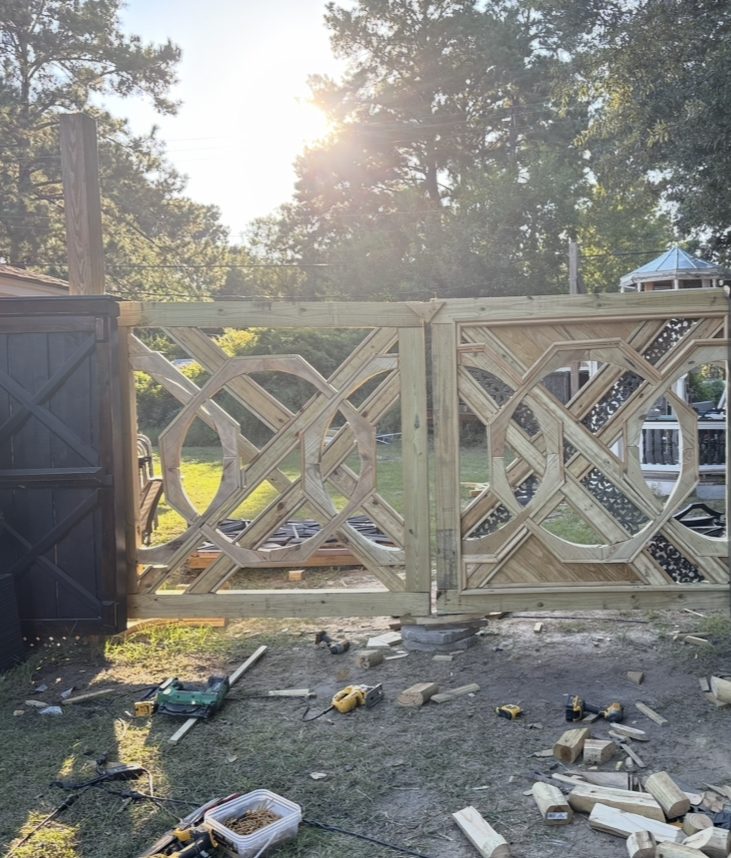 Unstained interlocking circle and octagon gate panels newly installed