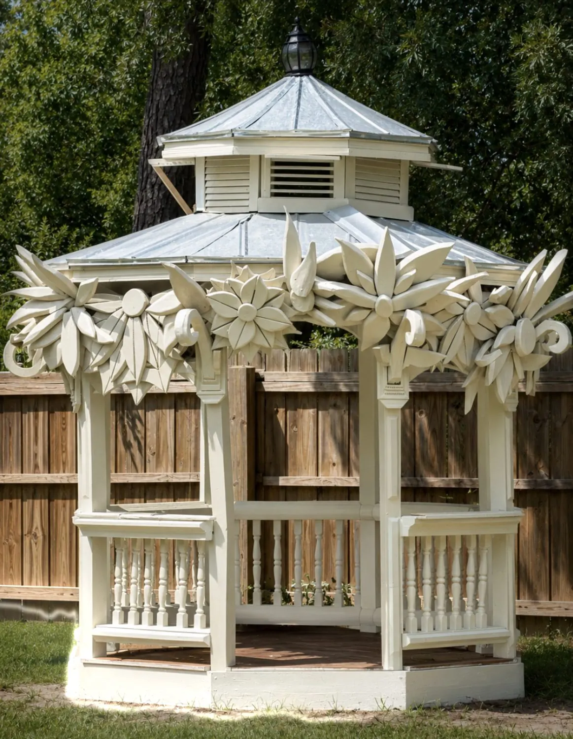 Hand-carved wooden florals crowning a custom gazebo in Savannah, Georgia