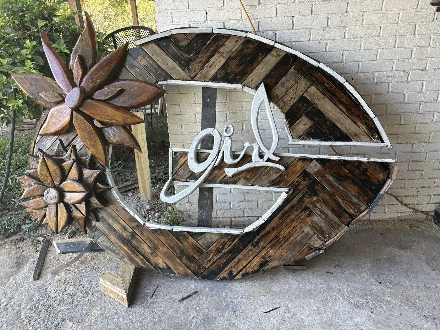 Large wooden G sign with girl script and carved florals
